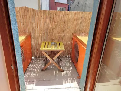 a small table sitting in the middle of a room at Kunterbunt Istanbul in Istanbul