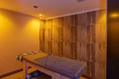 a room with a wooden wall with a bench in it at Vision Deluxe Hotel in Istanbul
