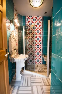 a bathroom with a sink and a shower at Sultan Corner Hotel in Istanbul