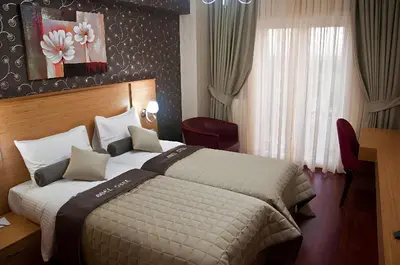 a hotel room with a bed and a window at Abel Hotel in Istanbul