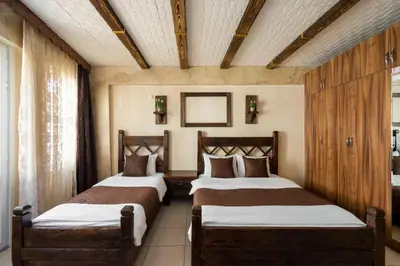 a bedroom with two beds in a room at Pi Home & Apartments in Istanbul