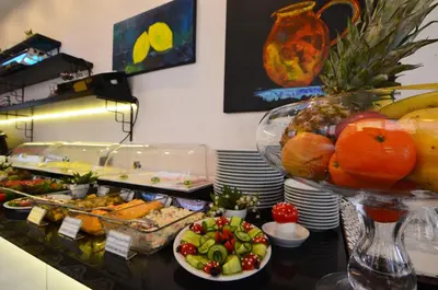 a buffet with a bunch of food on a table at Tempo Hotel 4Levent in Istanbul