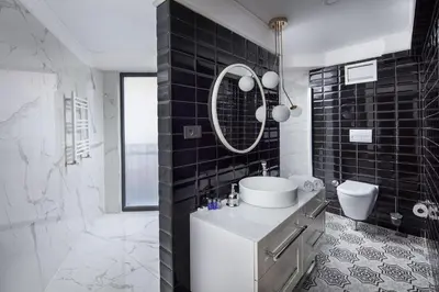 a bathroom with a sink and a mirror at B LOFT HOTEL in Bursa