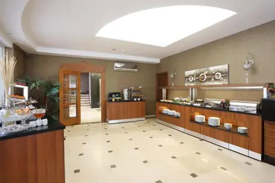 a large room with a buffetasteryasteryasteryasteryasteryasteryasteryasteryasteryastery at Balturk House Hotel in Kocaeli