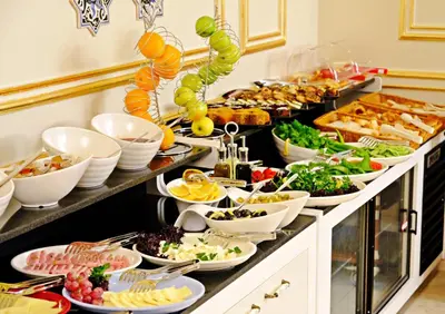 a buffet with a lot of food on it at KRALICE HOTEL in Istanbul