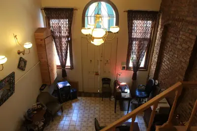 an overhead view of a hallway with a door and windows at Tom Square Boutique Hotel in Istanbul