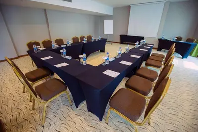 a conference room with a long table and chairs at Park Inn by Radisson Istanbul Asia Kavacik in Istanbul