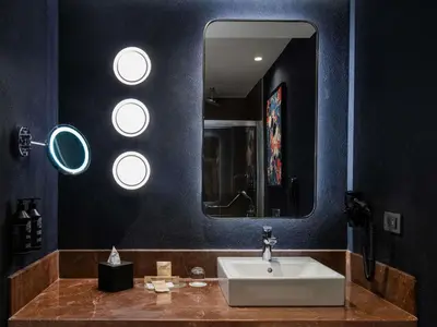 a bathroom with a sink and a mirror at Mercure Istanbul Altunizade in Istanbul