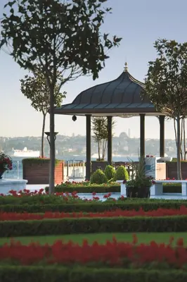a gazebo in a park with flowers and trees at Four Seasons Hotel Istanbul at the Bosphorus in Istanbul