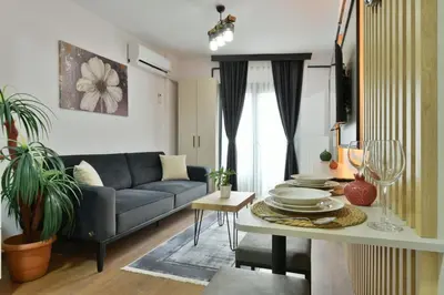 a living room with a couch and a table at Sea Moon Hotel in Istanbul