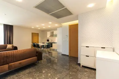a living room with a couch and a table at The Loft House Taksim in Istanbul
