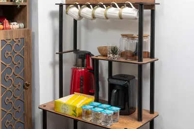 a shelf with a coffee maker on top of it at Taksim Mood in Istanbul