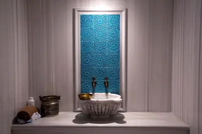 a bathroom with a sink in front of a window at Miracle Istanbul Asia Airport Hotel & Spa in Istanbul