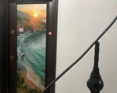 a picture of the ocean in a frame on a wall at ivy hostel cafe in Istanbul
