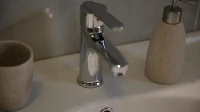 a bathroom sink with a faucet on a sink at Orchid Hills - heated swimming pool in Sapanca