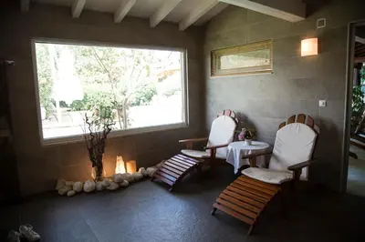 a room with two chairs and a table and a window at Casa Lavanda Boutique Hotel in Sile