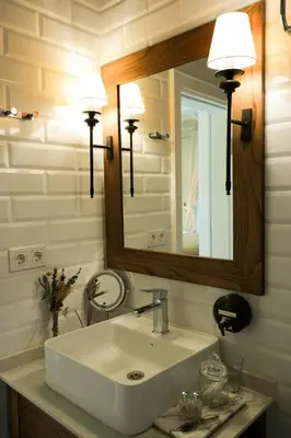 a bathroom with a white sink and a mirror at Casa Lavanda Boutique Hotel in Sile