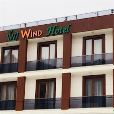 a building with a wind hotel sign on it at WİND HOTEL in Sakarya