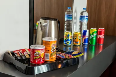 a counter with cans of food and drinks on it at DORUK PALAS HOTEL in Istanbul