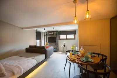 a living room with a couch and a table at Cityloft 36 in Istanbul