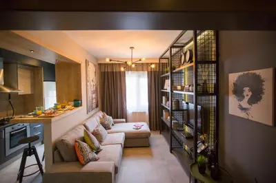 a living room with a couch and a table in a room at Cityloft 36 in Istanbul