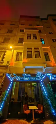 a building with a sign on the front of it at taksim diamond hotel in Istanbul