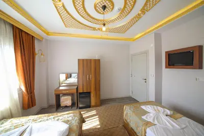 a hotel room with a bed and a desk at DELBAB HOTEL in Istanbul