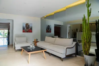 a living room with two couches and a table at Didi Hotel Sapanca in Sapanca