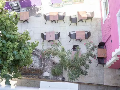 a group of tables and chairs on a wall at The Zanadu İstanbul in Istanbul