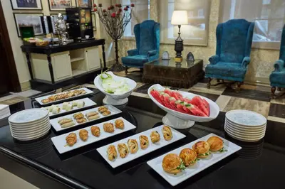 a buffet of food on a table in a hotel room at Konak Hotel Taksim in Istanbul