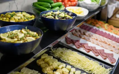 a buffet of different types of food on display at Gleam Bomonti Hotel in Istanbul