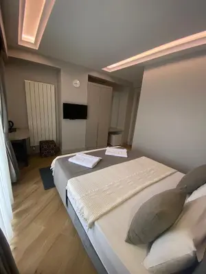 a bedroom with a large bed in a room at KONAK BELLA 3 in Istanbul