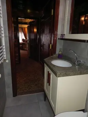a bathroom with a sink and a mirror at Kayıbeyi Hotel & Restaurant in Bursa