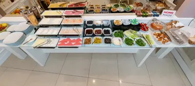 a table filled with lots of different types of food at Mr. Bird Hotel in Istanbul