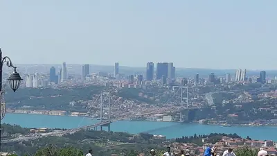 a view of a city with a bridge over a river at Boğazın incisi.. in Istanbul