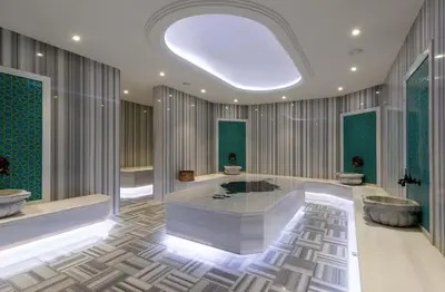 a bathroom with a large tub and a large window at The Craton Hotel Sisli in Istanbul