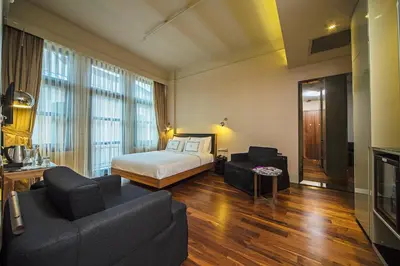 a hotel room with a bed and a couch at The Haze Karaköy in Istanbul