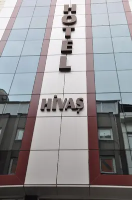a sign on the side of a building at Hivas Hotel in Istanbul