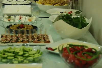 a table with many different types of food on it at Topkapı Otel Özyavuz in Istanbul