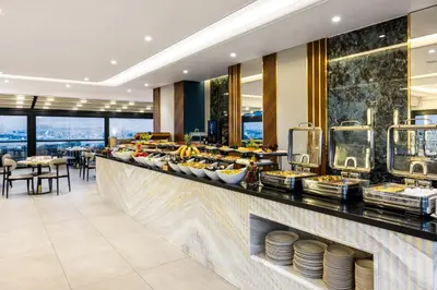 a buffet line in a hotel with food on it at Rast Hotel Sultanahmet in Istanbul