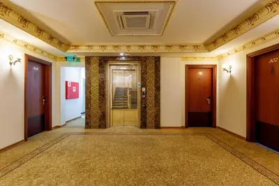 a hallway of a building with a glass door at Rast Hotel Sultanahmet in Istanbul