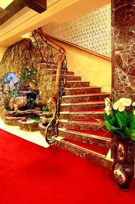 a staircase in a room with a red carpet at Elan Hotel Istanbul Pera in Istanbul