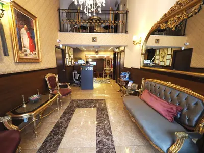 a living room with a couch and a table at Elysion Hotel in Istanbul