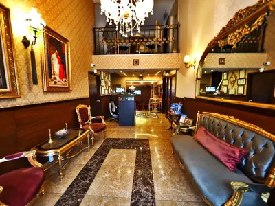 a living room with a couch and a table at Elysion Hotel in Istanbul