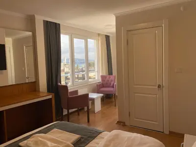 a hotel room with a bed and a window at Spinel Hotel - Old City in Istanbul