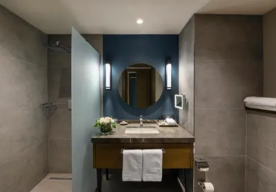 a bathroom with a sink and a mirror at Elite World Grand Sapanca in Sapanca