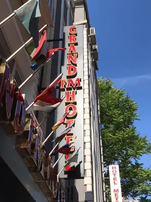 a hotel sign on the side of a building at Grand FM Hotel in Istanbul