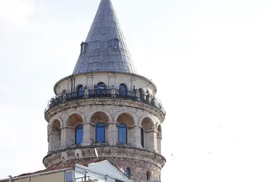 a tower with a steeple on top of a building at Meroddi La Porta in Istanbul