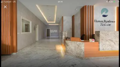 a lobby of a hotel with a reception desk at CTS Taksim Elysium Residence Dublex D-84 in Istanbul