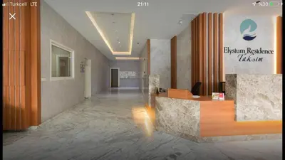 a lobby of a hotel with a reception desk at CTS Taksim Elysium Residence Dublex D-84 in Istanbul